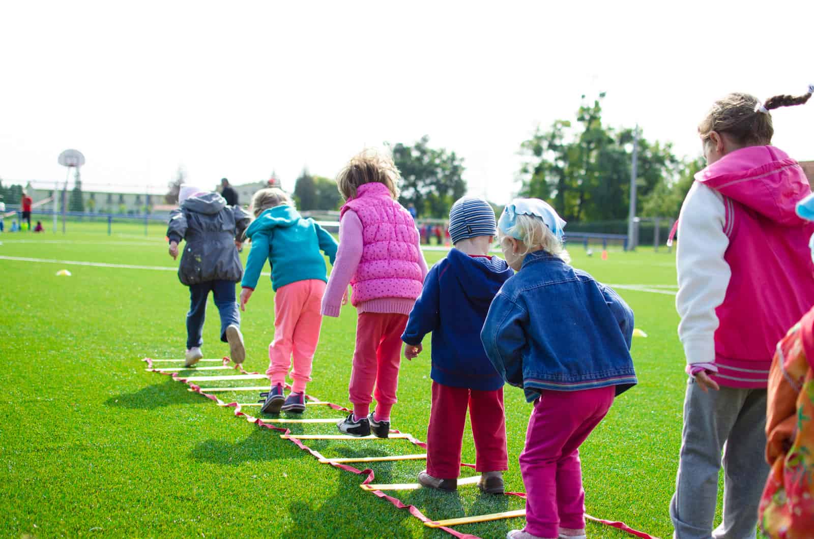 Kids together in jumping competition