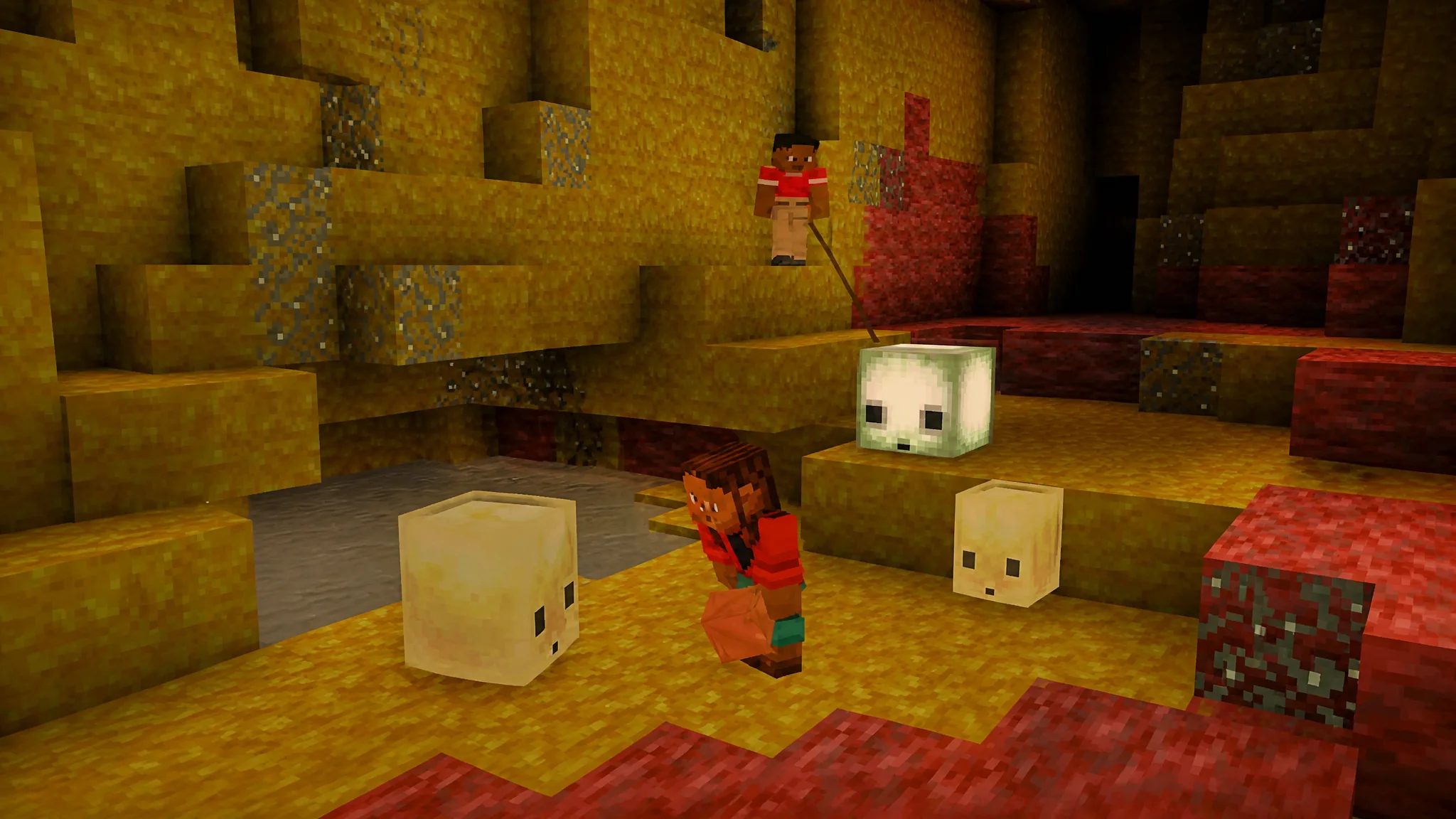 Two players with sulfur cubes in cave in minecraft