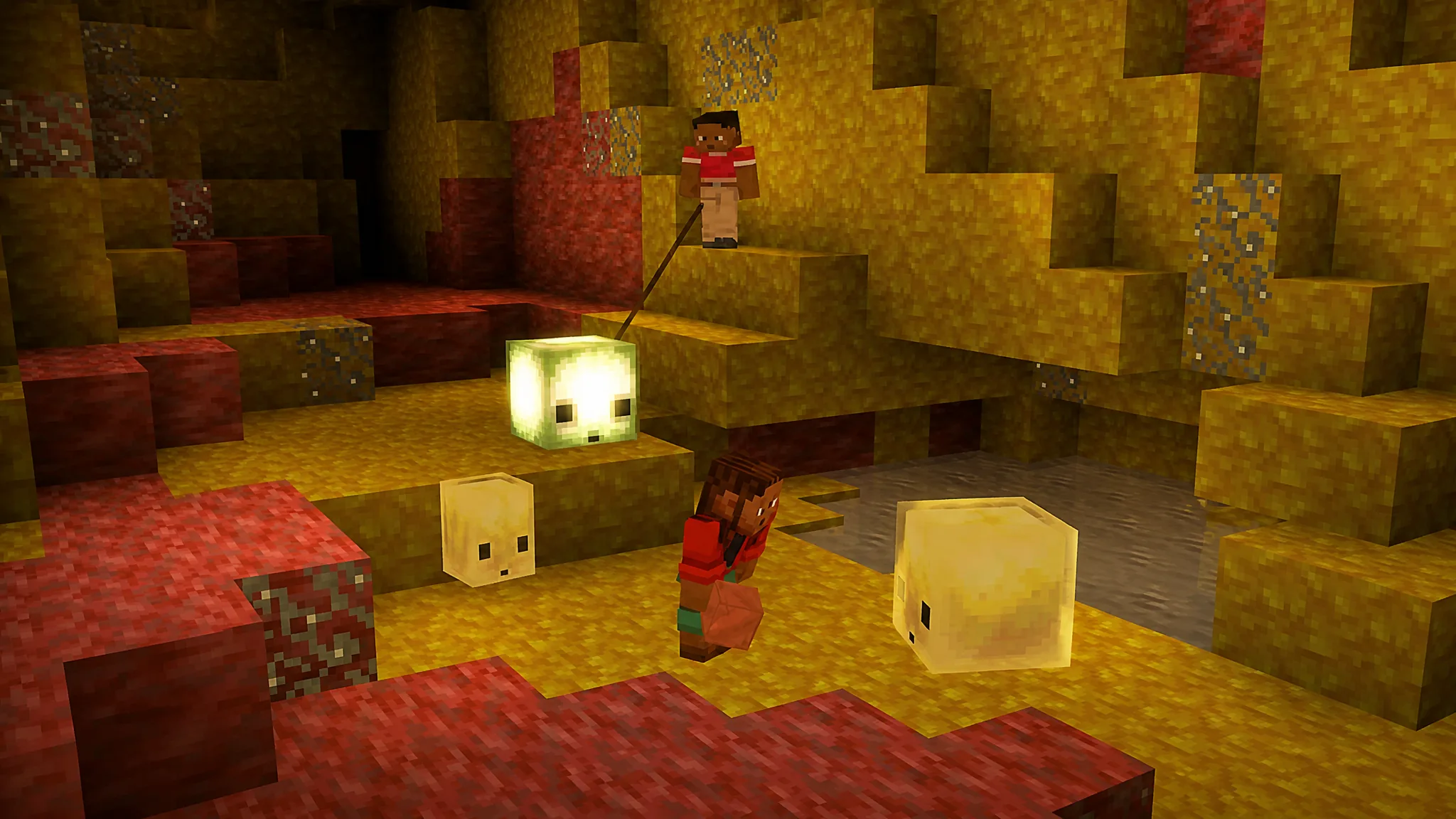 Two players with sulfur cubes in cave in minecraft