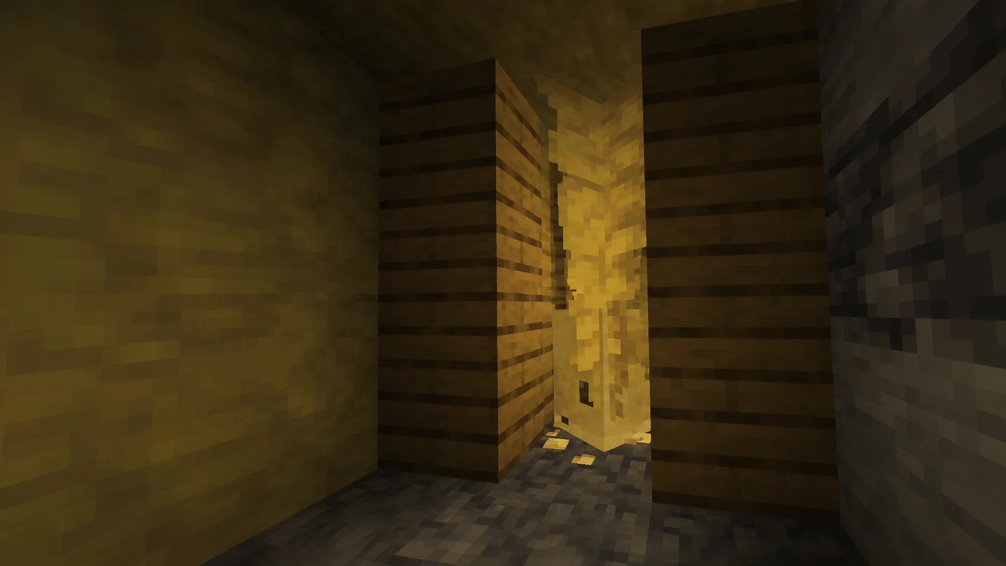 A sulfur cube in a mineshaft in minecraft