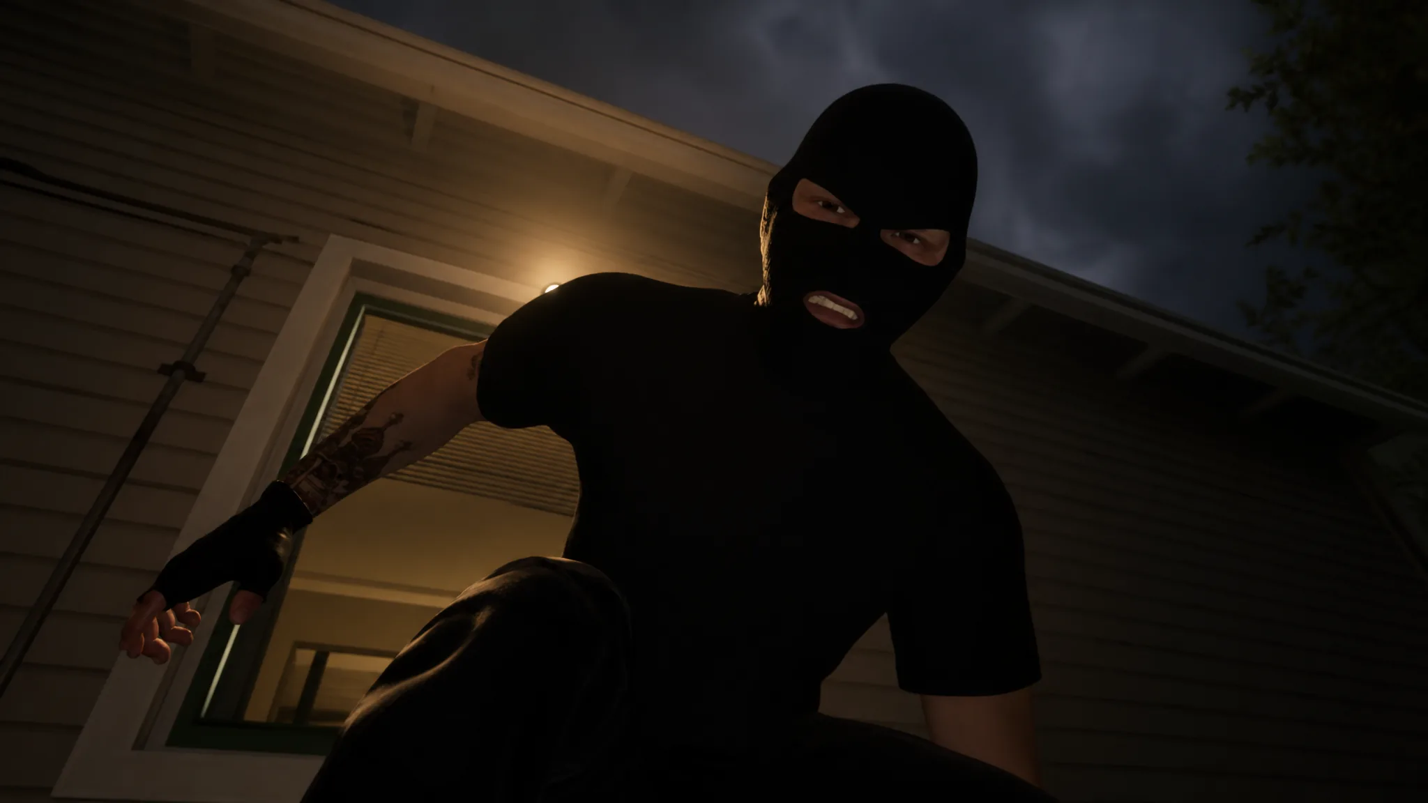 Kidnapper in all black and masked, looking down at Simon