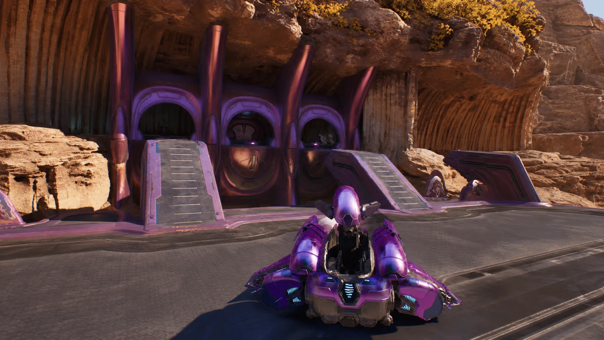 Master Chief piloting a captured Wraith against Covenant forces