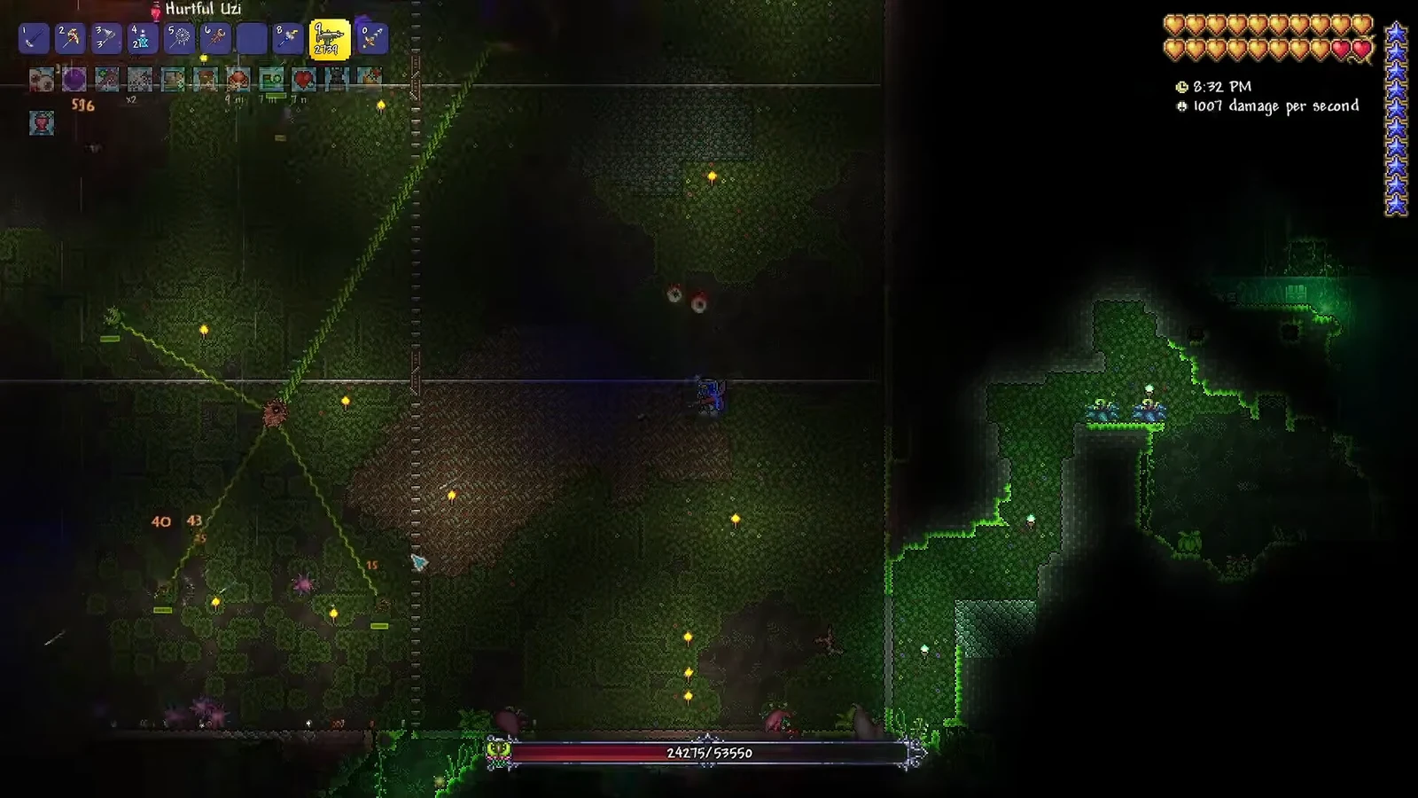 Hateful Uzi equipped against a jungle boss with its health bar shown