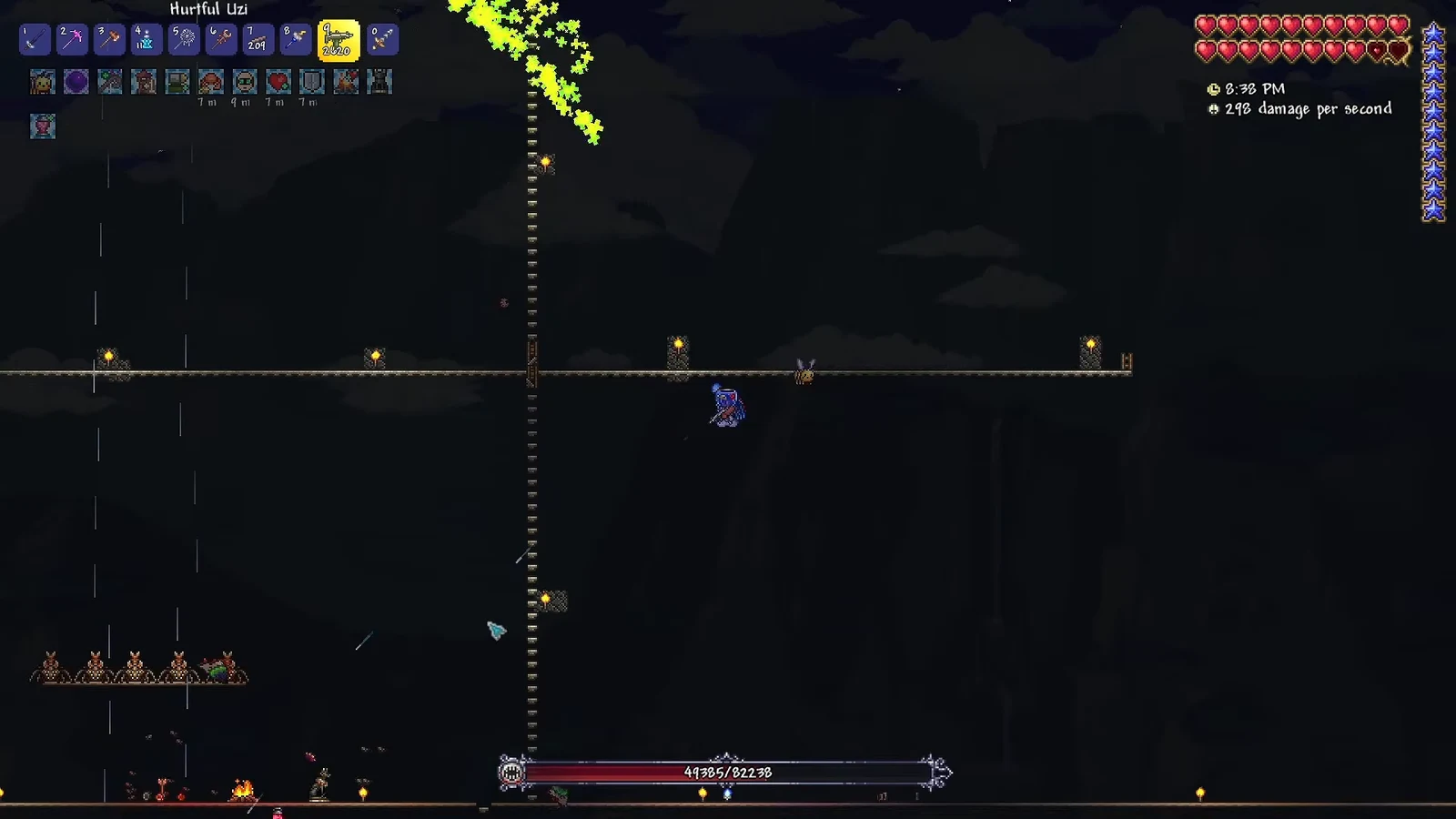 Hurtful Uzi firing at a Terraria boss with the health bar visible