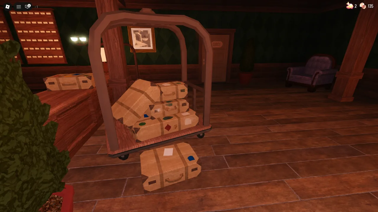 A luggage cart stacked with parcels and a loose suitcase in an Archives corridor
