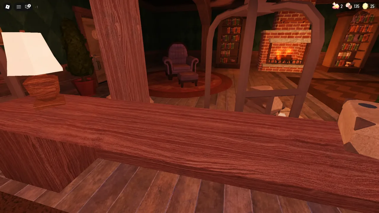 First-person view of a lit fireplace and furnished room where a television could hide Noise