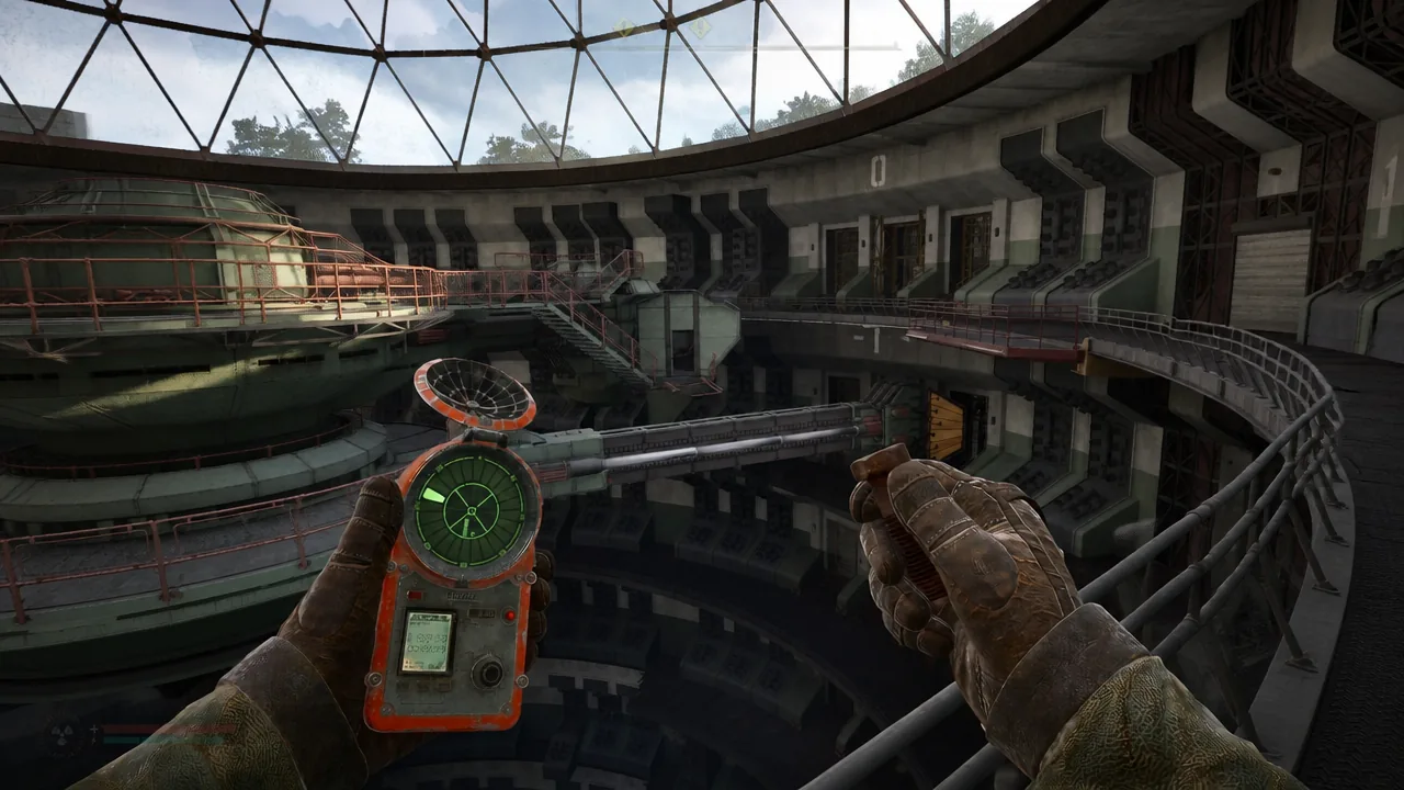 A handheld detector sweeps a circular industrial chamber for signals during the X16 laboratory break-in