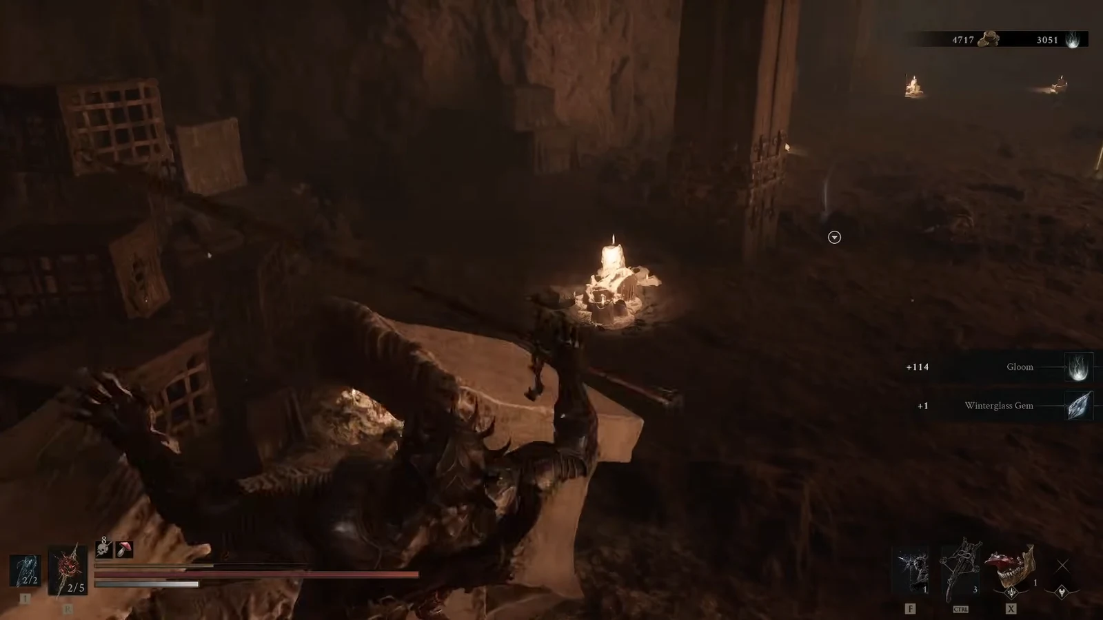 Loot notifications on the right of the screen confirming Gloom and a Winterglass Gem were collected in the cave