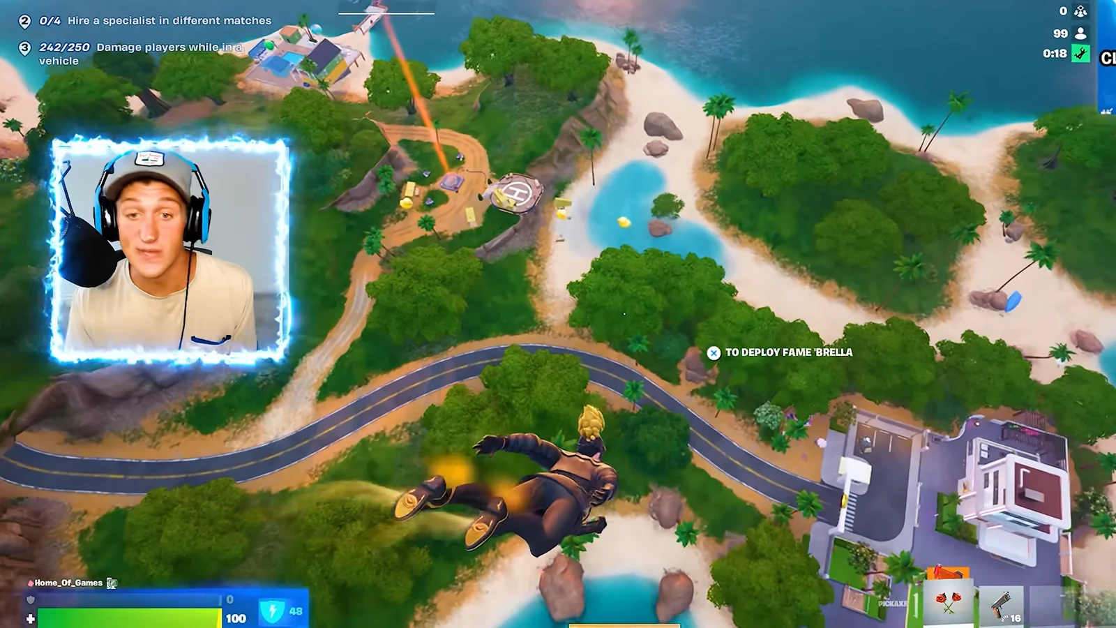 Player gliding over the island with the deploy prompt visible while descending
