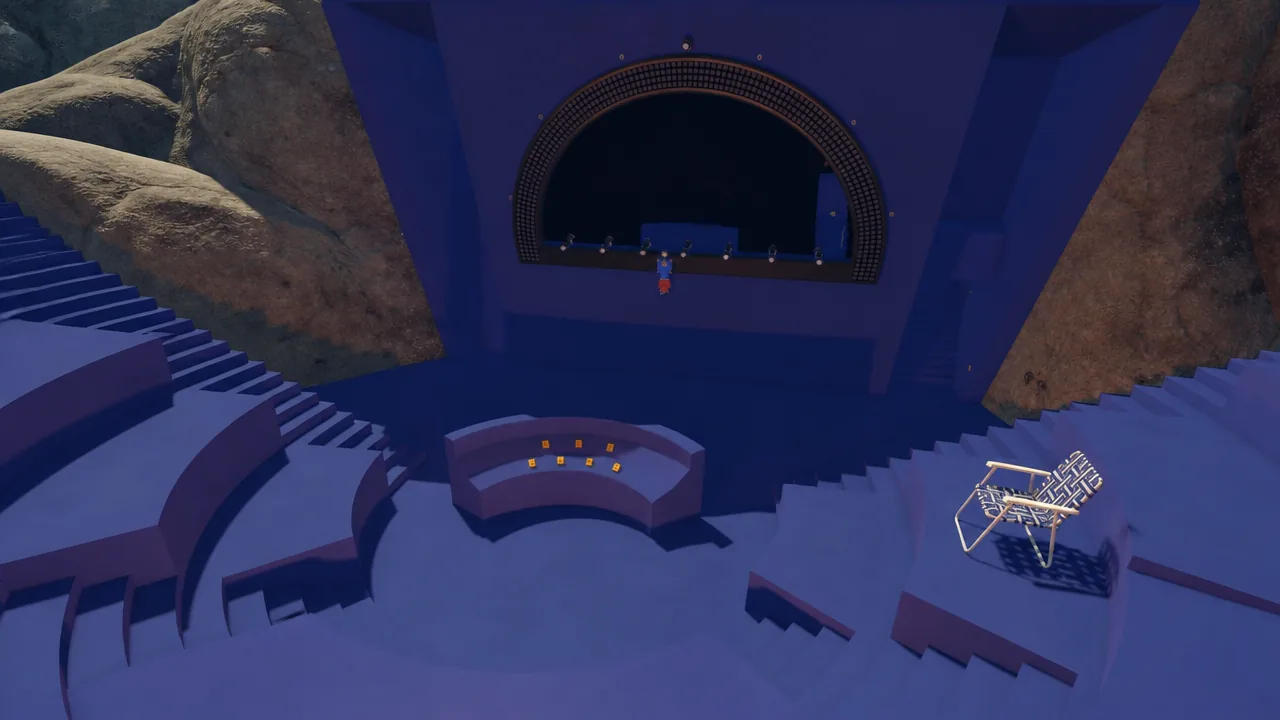 A virtual amphitheater with tiered seating, a stage, and a lounge chair