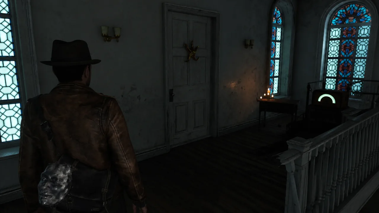 Player standing in front of the locked Star Key door on the church's second floor
