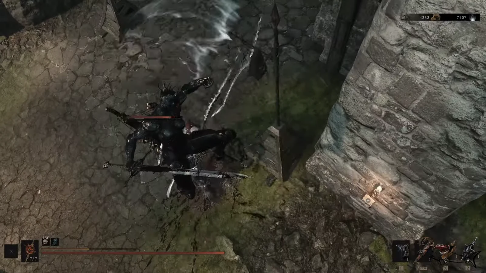 Armored character swinging a sword at an enemy beside a stone wall
