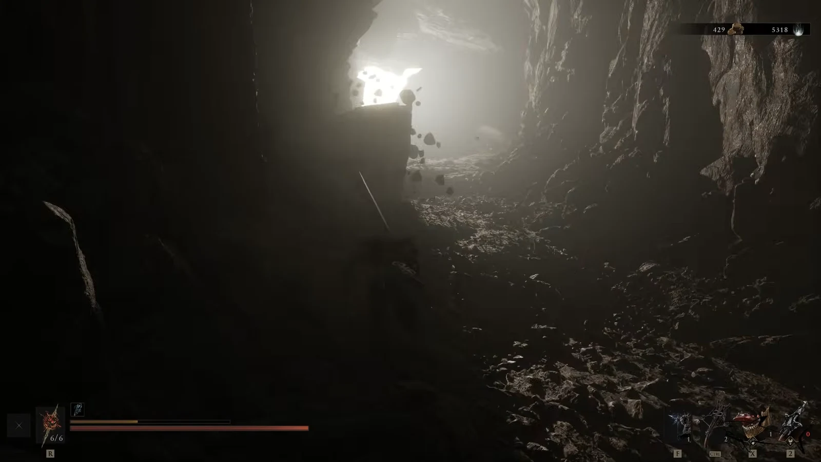 Character advancing through the rocky cave toward a bright opening during the collapse