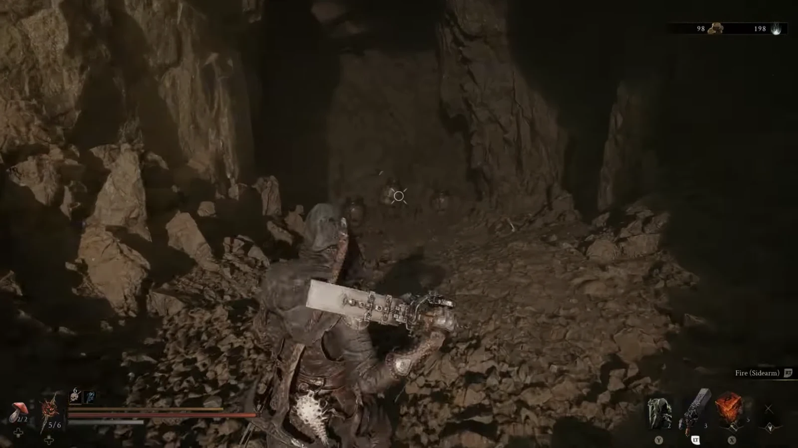 Player aiming a sidearm at a cave target with a Fire Sidearm RT prompt