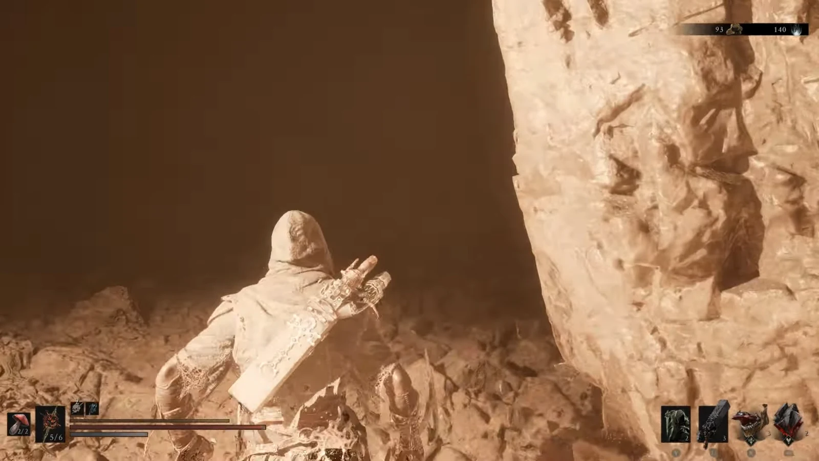 Hooded character approaching a dark cavern opening with health and equipment HUD
