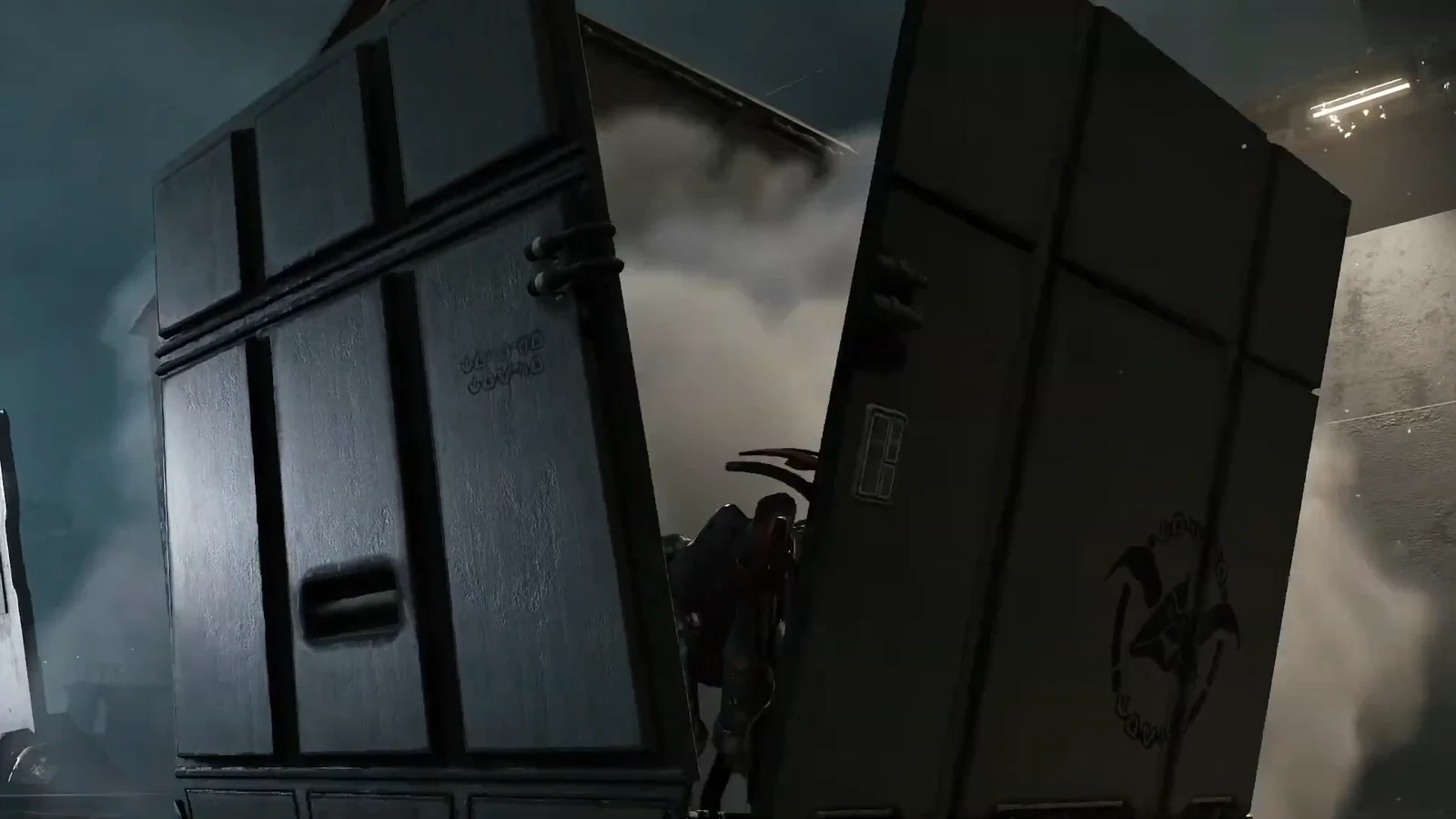 Large metal double doors being pushed open onto a smoke-filled industrial area