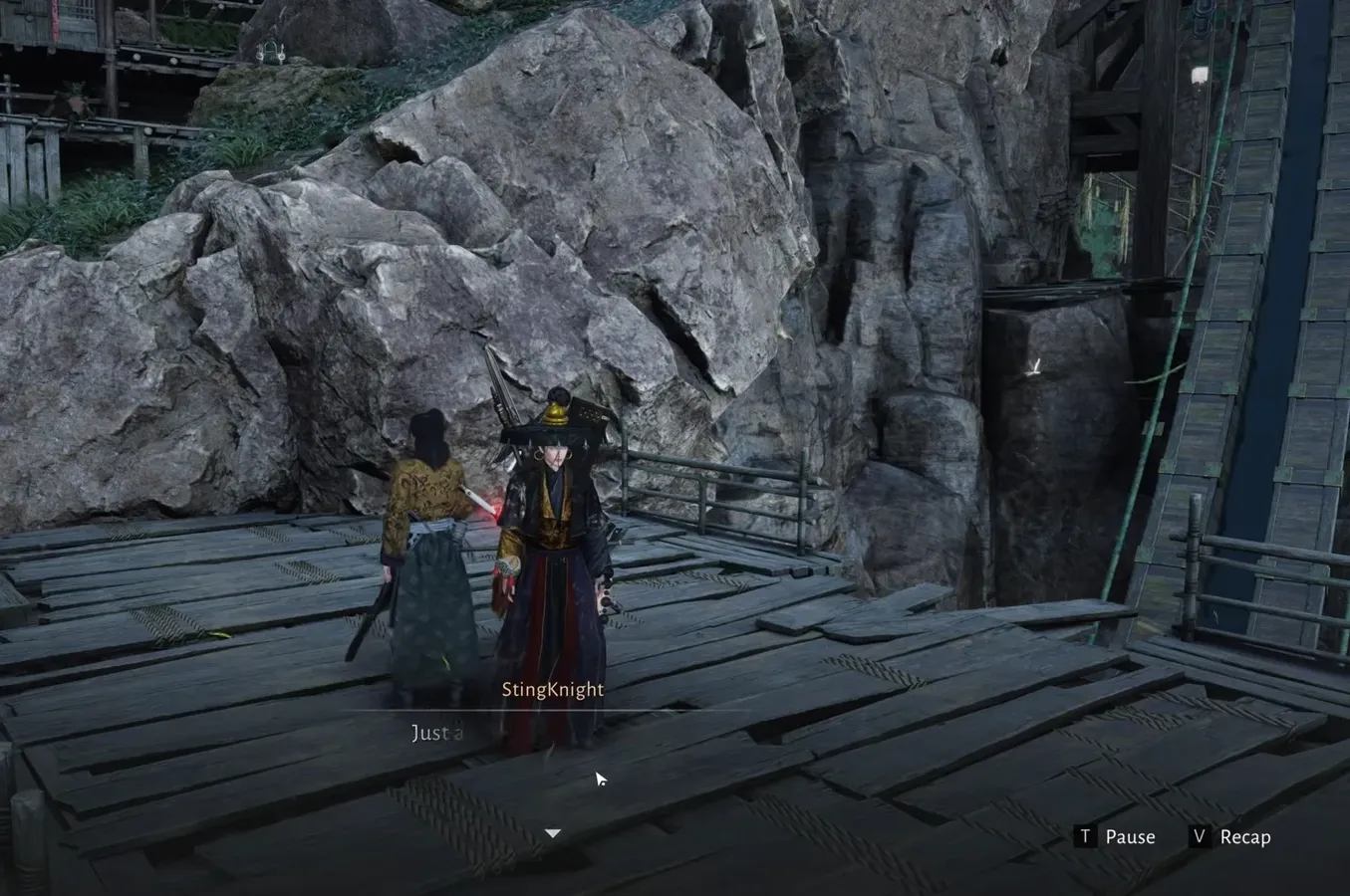 Player standing on the wooden platform at the clifftop as the closing dialogue plays
