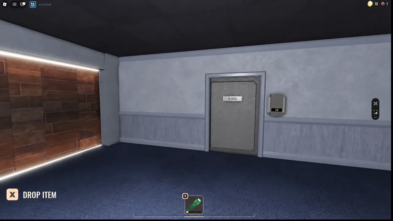 Player at door A-002 using a keypad while holding a green flashlight in early Archives rooms