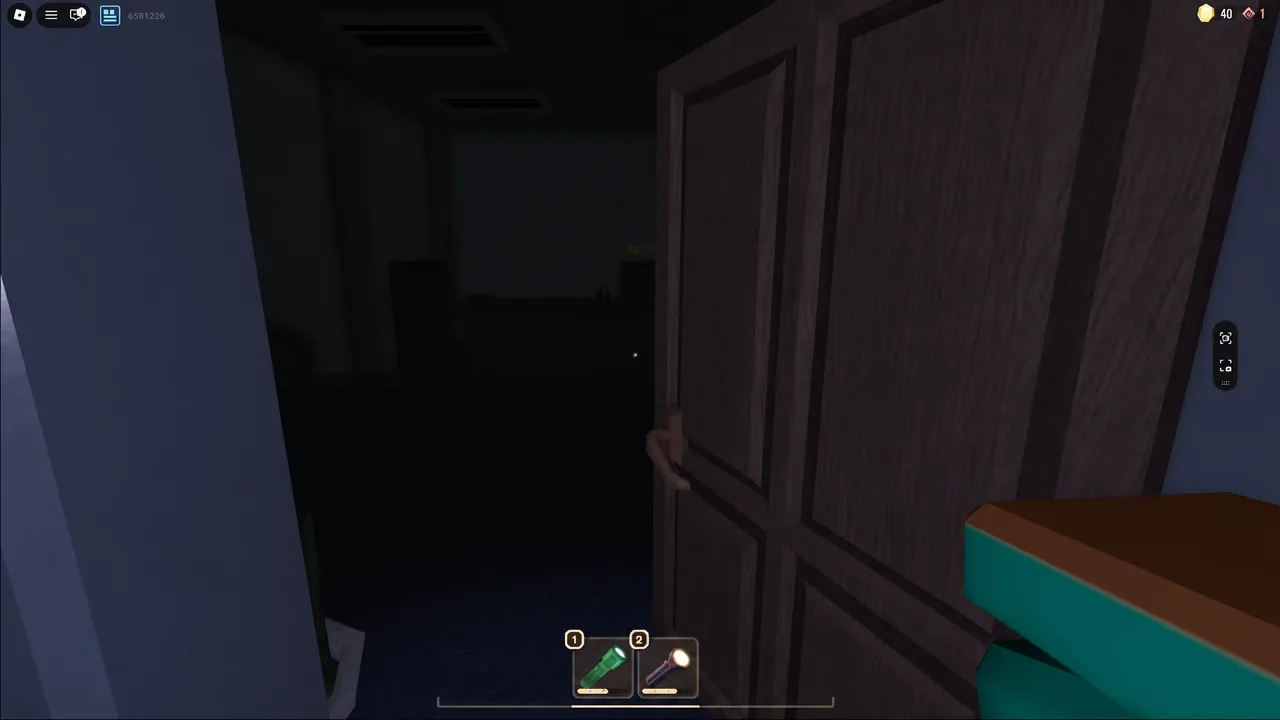 Player opening a wooden door with a green tool selected in inventory slot 1