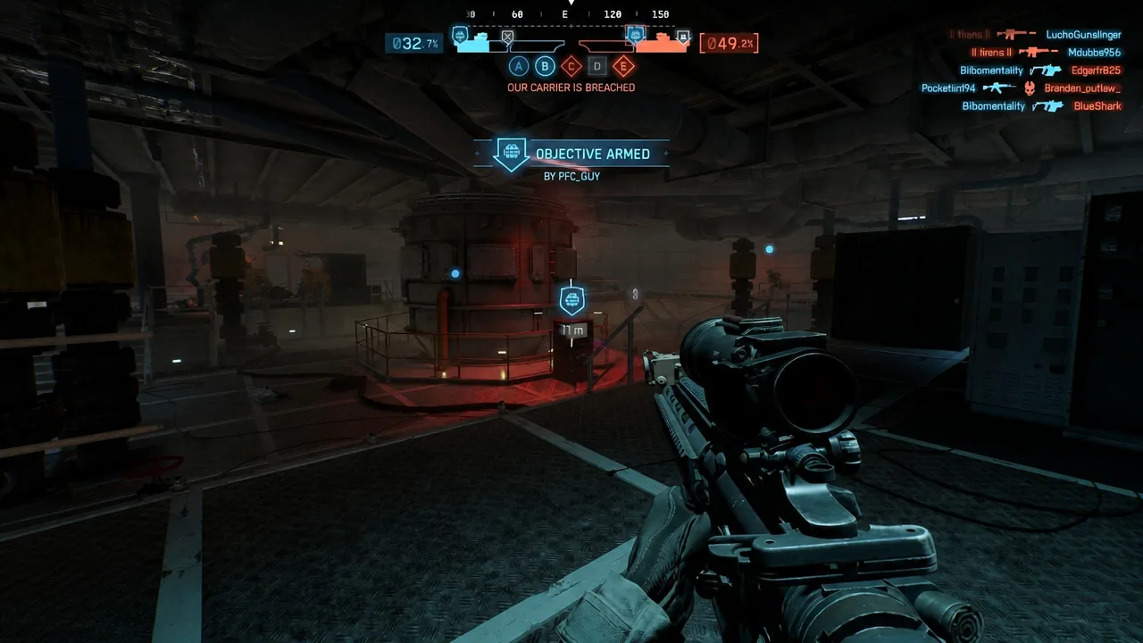 OBJECTIVE ARMED indicator on the HUD as a player closes in on the 11-meter objective marker