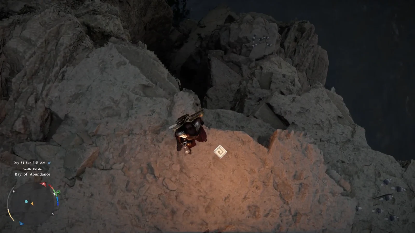 Character standing over a glowing spiral marker on a rocky ledge above the crevice drop