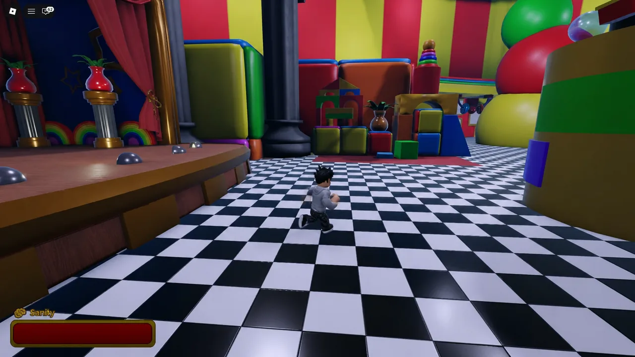 Player character running over the checkered circus floor with the Sanity meter in the corner