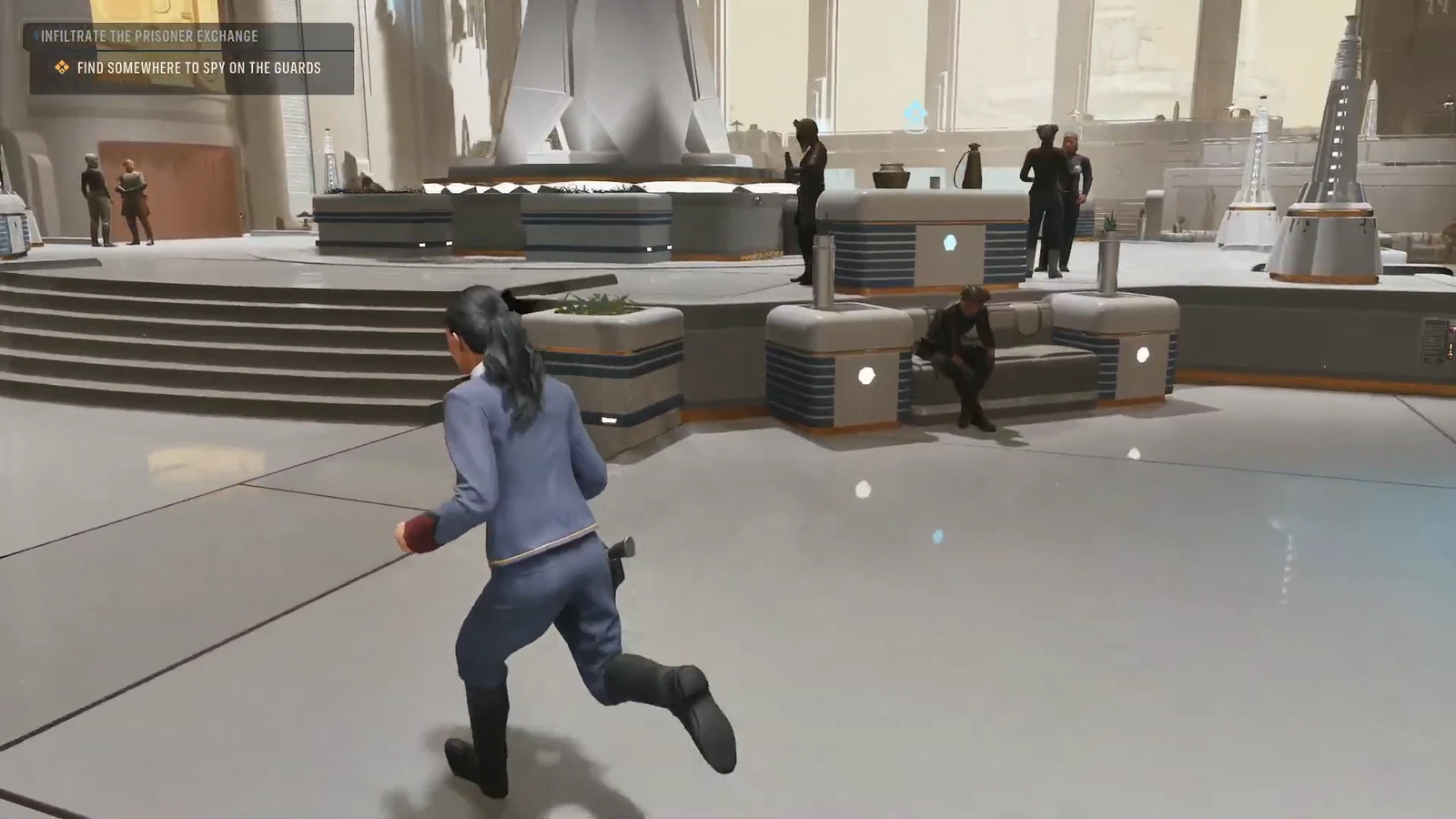 Hawks crossing the prisoner exchange lobby toward the staircase with the spying objective active