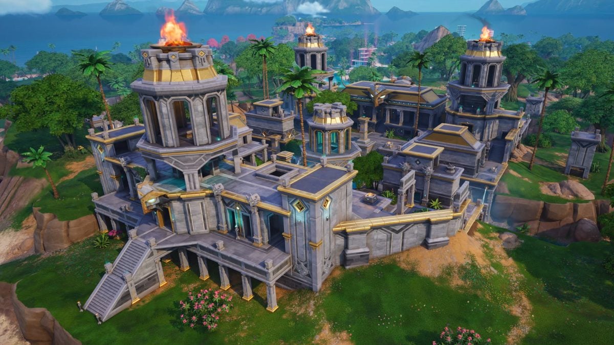 Stone temple ruins POI surrounded by greenery on the Override island