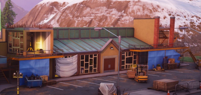 Unfinished Fortnite restaurant building placed next to the Freddy Fazbear's Pizzeria exterior from the FNAF film
