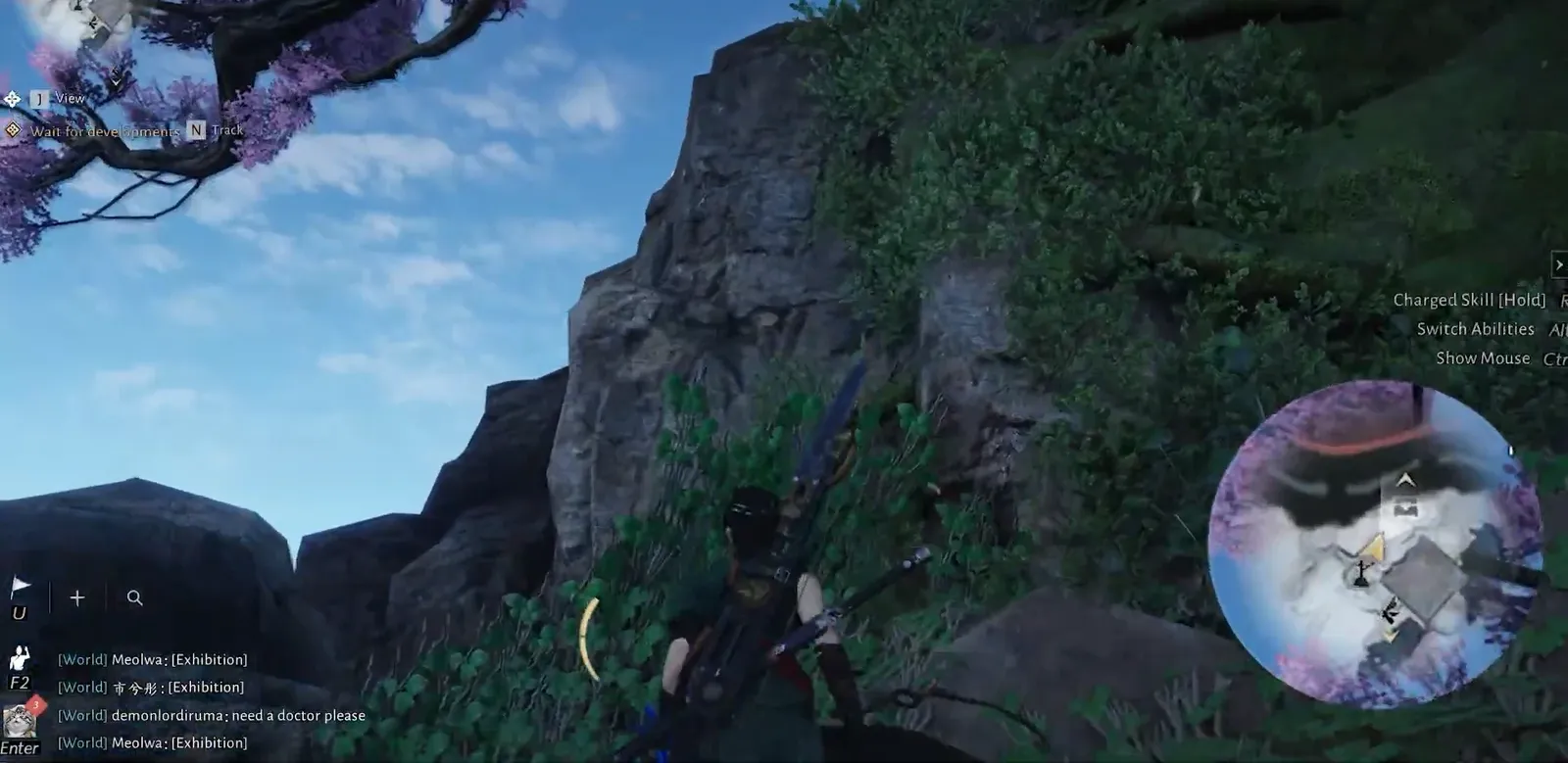Player climbing a rocky cliff in Goldflow Slope while searching for chest 5 of 23