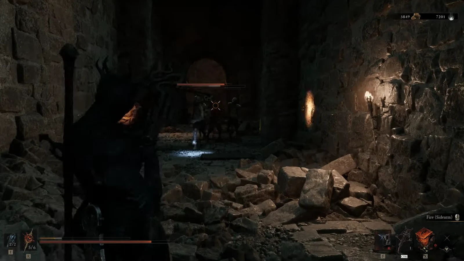 Player aiming a sidearm at an enemy in a dark stone corridor