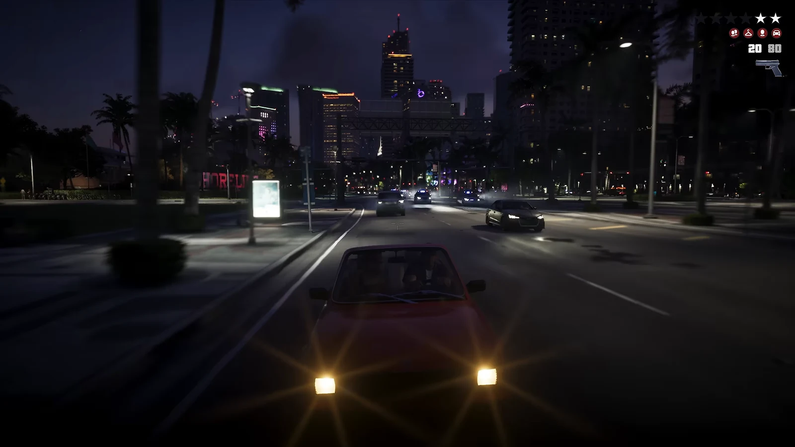Night driving in Vice City with the wanted level and ammo counter shown in the HUD