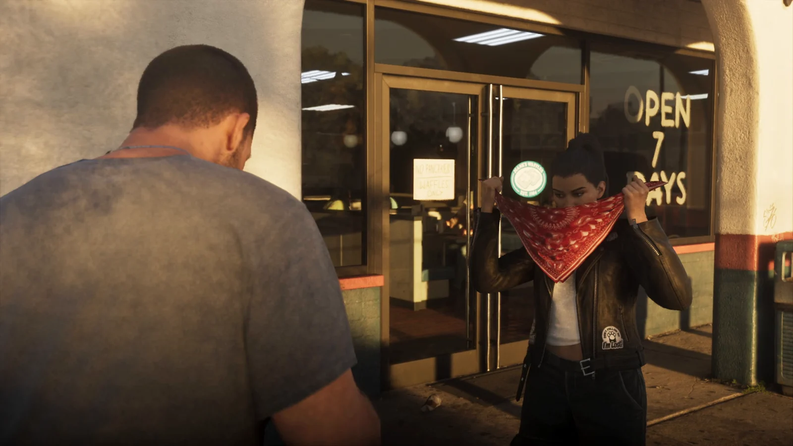 Lucia pulling a bandana over her face outside the diner in GTA 6