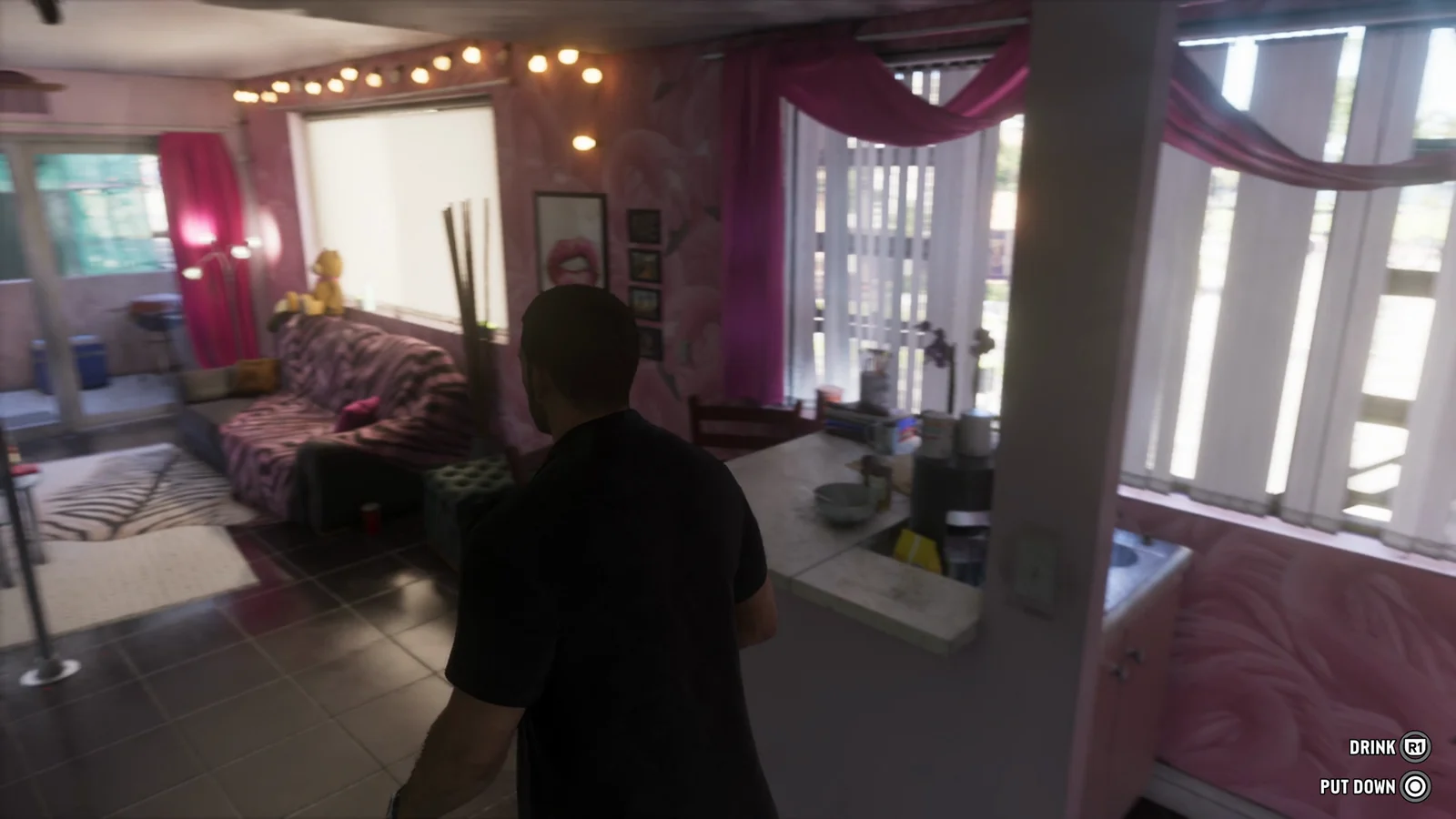 R1 drink and Circle put down prompts while holding a bottle in GTA 6