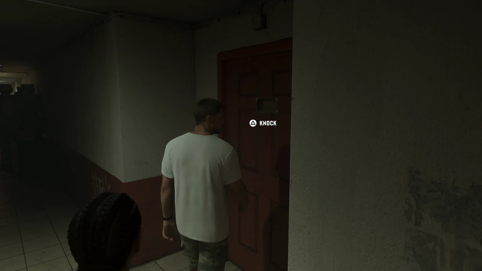 Triangle prompt to knock on an apartment door in GTA 6