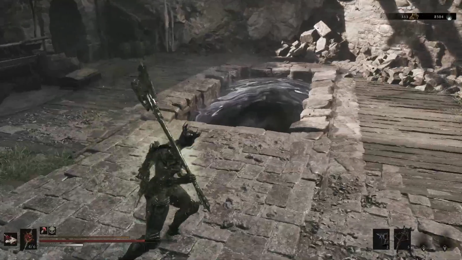 Armored character with a polearm approaching a circular pit in a ruined stone courtyard