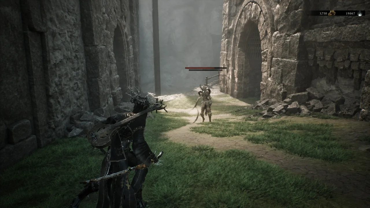 Fighting a sword-wielding enemy in the ruined stone courtyard below the Beacon