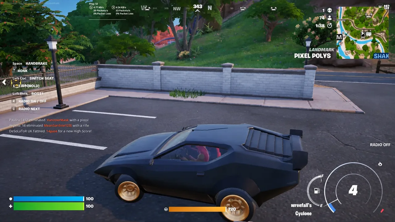 Driving a Cyclone past the Pixel Polys landmark toward an Override Console marker