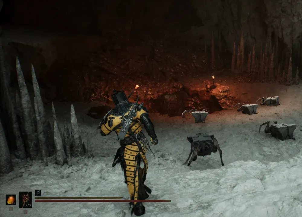 Player exploring a torchlit cavern scattered with chests deep inside the crater