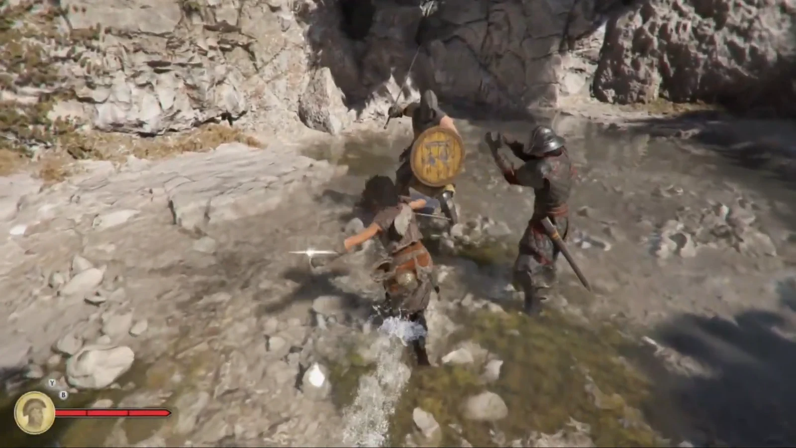Sophia strikes a shield-carrying soldier with her sword in a rocky stream