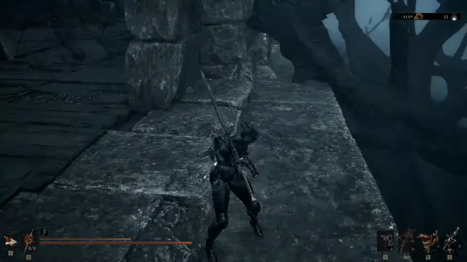 Character with sword drawn crossing the narrow stone walkway toward the chest platform