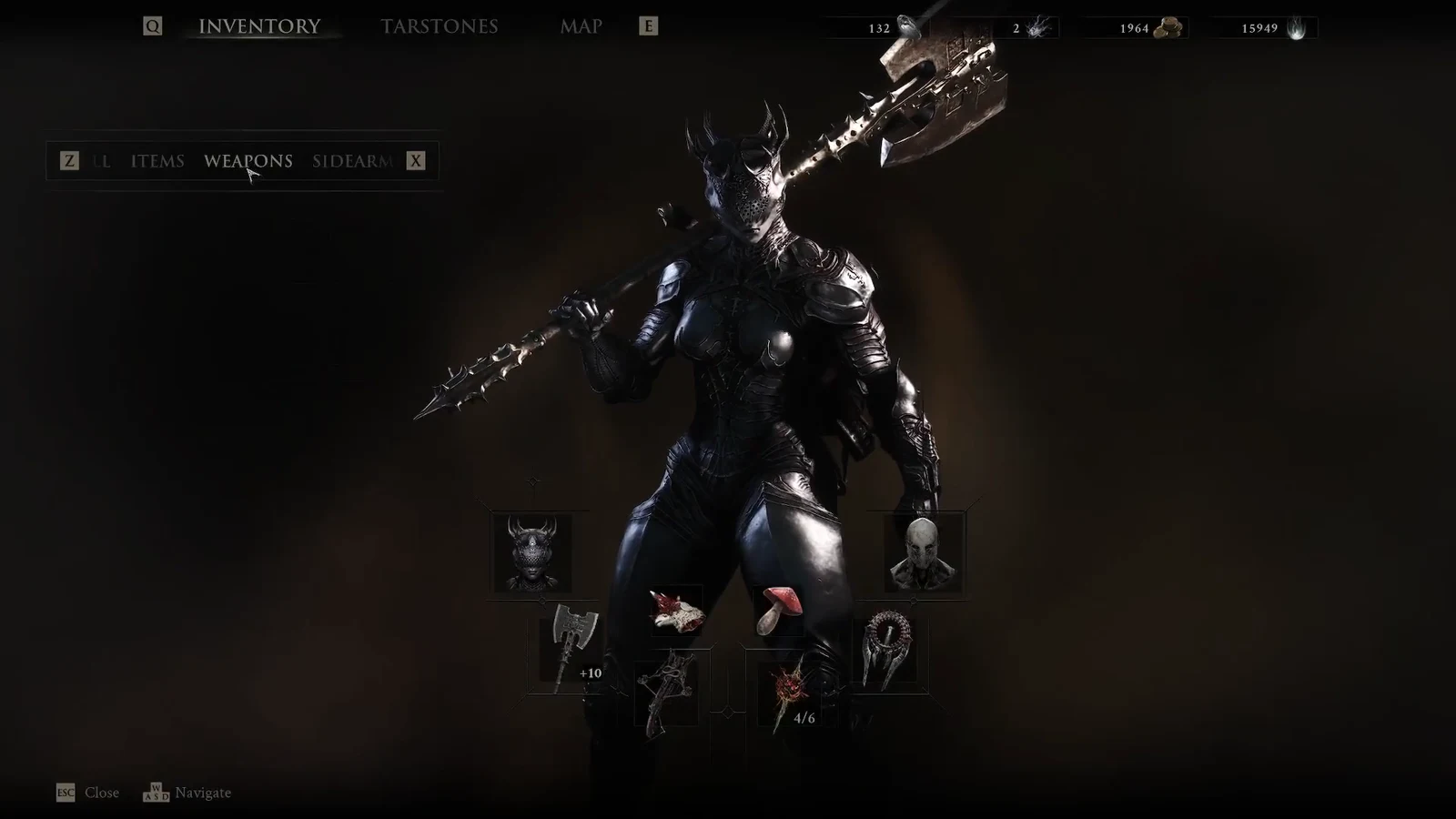 Inventory Weapons tab showing the character's equipped loadout being navigated