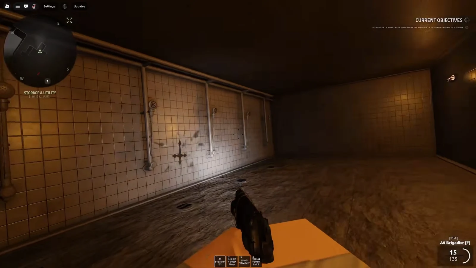 First-person view of a dark facility hallway with an on-screen objective prompt