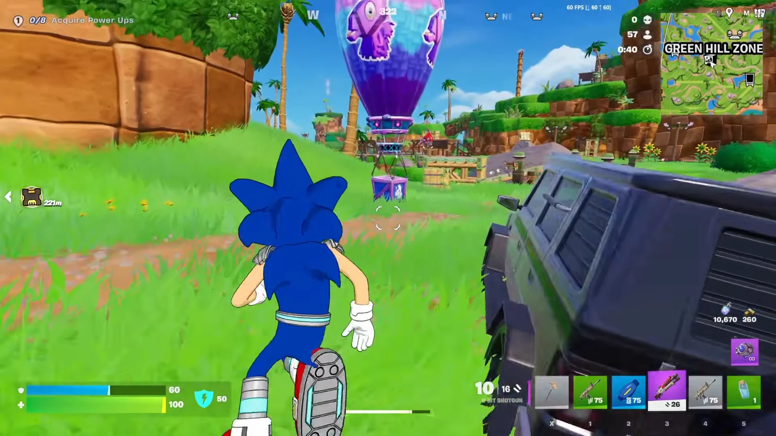 Player with a shotgun approaching a suspended purple power-up crate in Green Hill Zone