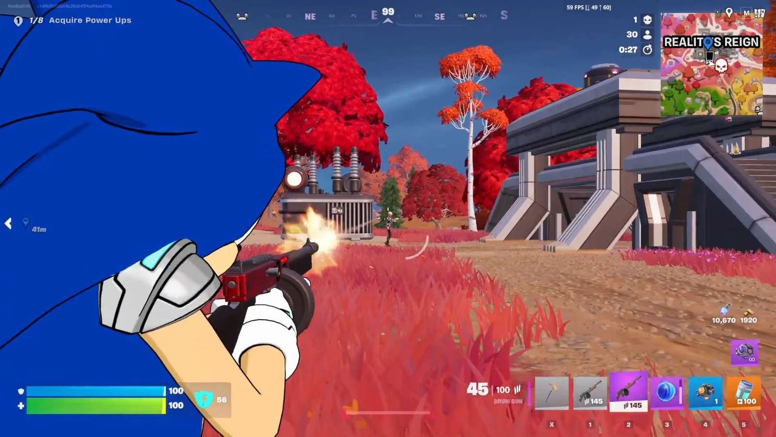 Player firing a Drum Gun at an enemy near a futuristic building