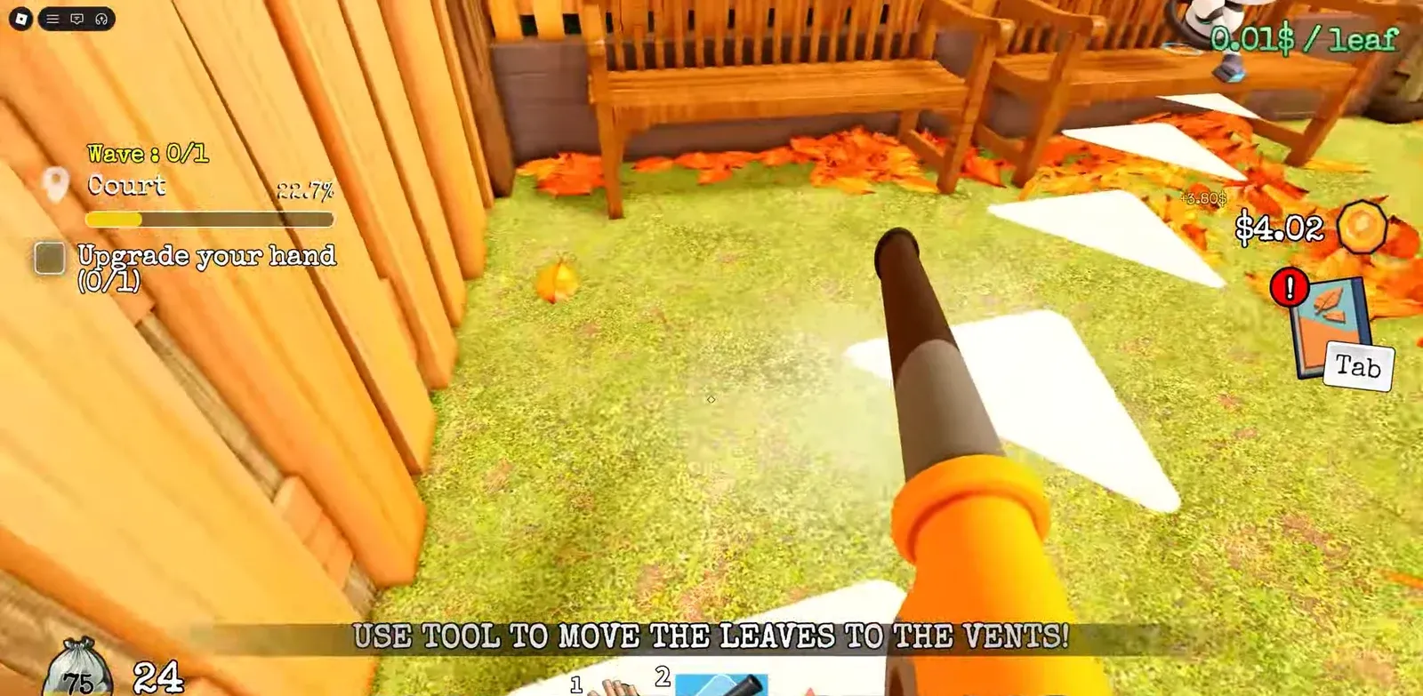 Leaf blower aimed at scattered leaves in the Court area