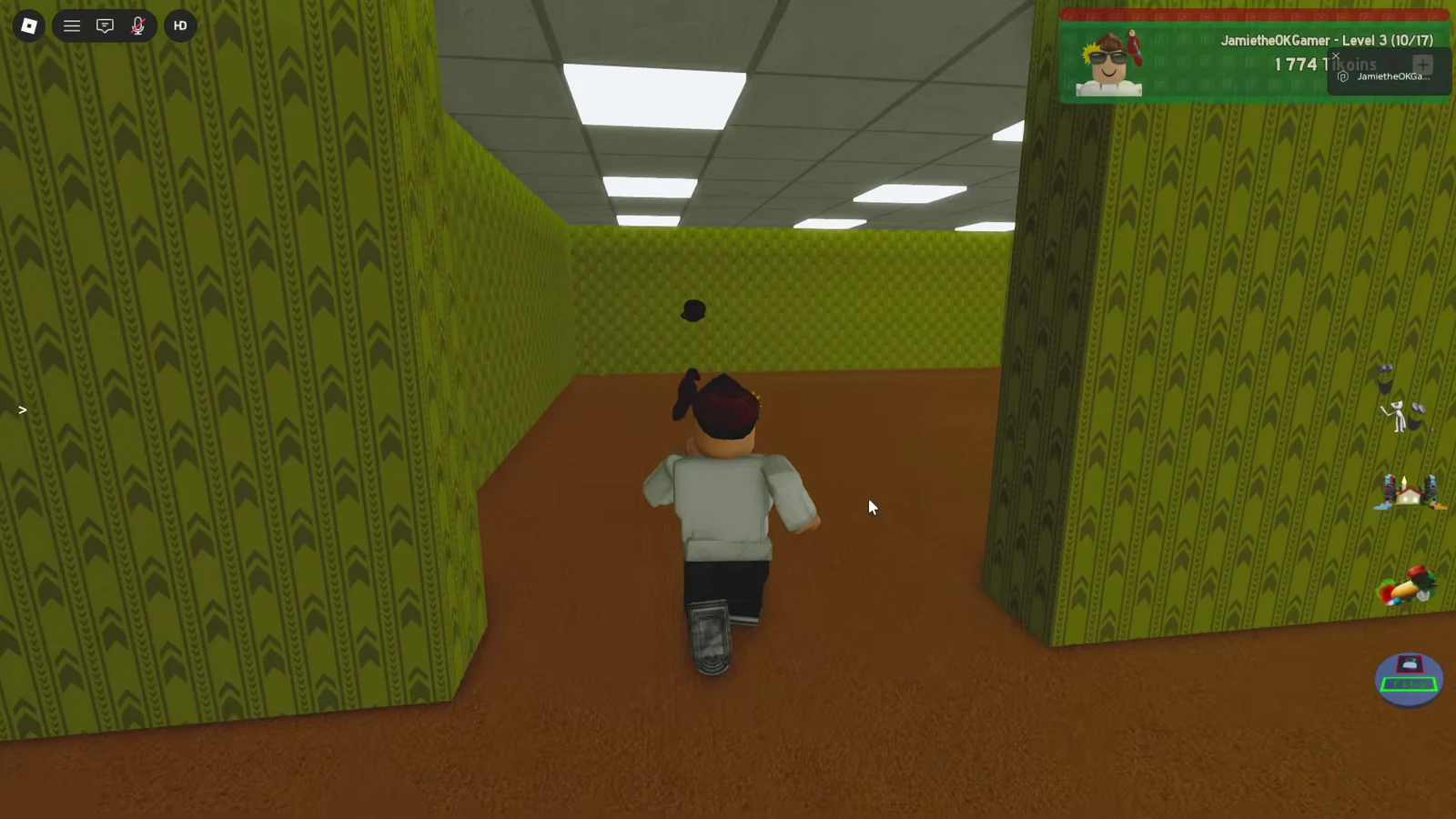 Avatar running through a maze corridor toward the floating Bacteria pickup
