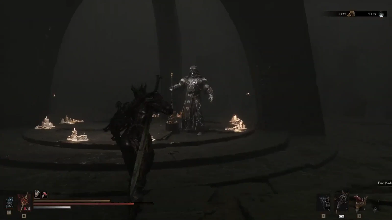 Player locking onto a robed, staff-wielding boss in a candlelit circular arena