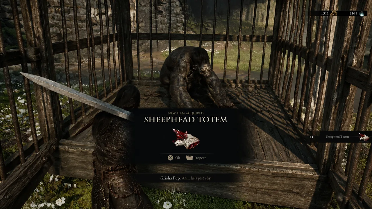 New Item Acquired prompt in Mortal Shell 2 showing the Sheephead Totem with Ok and Inspect options