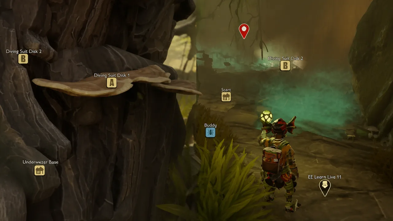 Navigating a cavern toward a red waypoint with Diving Suit disk markers on screen